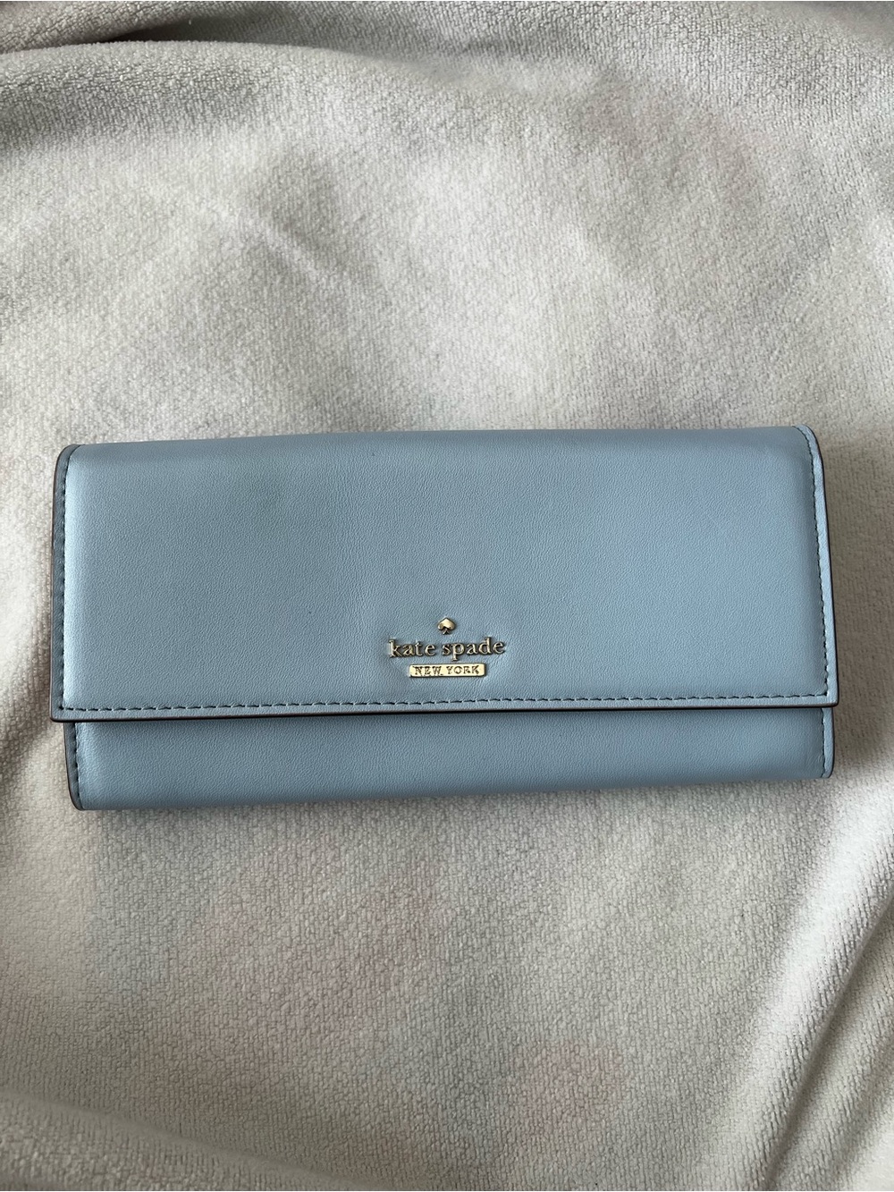 kate spade pastel blue continental wallet with gold logo